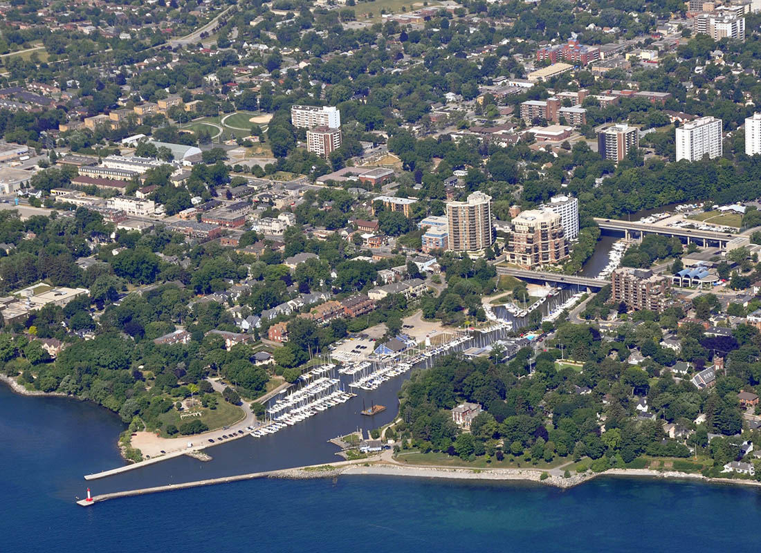 Oakville, ON - Aerial View of Surrounding Cities and Coast in Oakville, Ontario On a Sunny Day